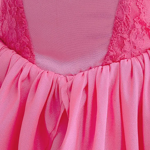 Close-up of layered pink lace dress for girls, showcasing elegant fabric and flowing design for summer events.