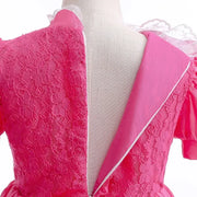 Back detail of a pink layered dress for girls, featuring lace and short sleeves, perfect for summer events and cosplay.